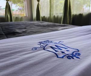 Postel nebo postele na pokoji v ubytování Hostal Wan Ka Trujillo