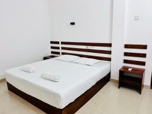 Postel nebo postele na pokoji v ubytování Namal Guest House