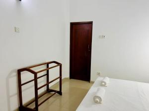 Postel nebo postele na pokoji v ubytování Namal Guest House
