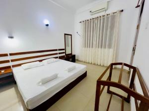 Postel nebo postele na pokoji v ubytování Namal Guest House