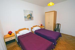 Postel nebo postele na pokoji v ubytování House Cvit