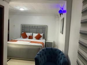 Llit o llits en una habitació de JCB Hotel