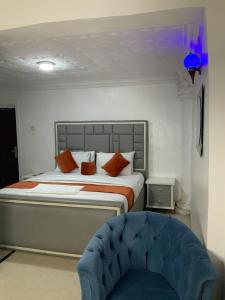Llit o llits en una habitació de JCB Hotel