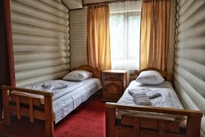 Letto o letti in una camera di Gotel Milenium