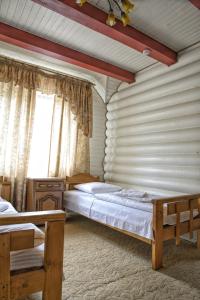 Letto o letti in una camera di Gotel Milenium
