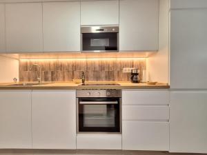 A kitchen or kitchenette at Playa Denia
