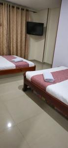 Postel nebo postele na pokoji v ubytování Hotel kristal campestre