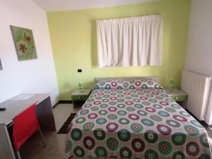 Postel nebo postele na pokoji v ubytování B&B Le Terrazze