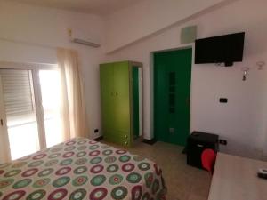 Postel nebo postele na pokoji v ubytování B&B Le Terrazze