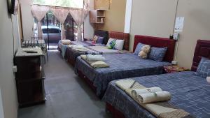 Ένα ή περισσότερα κρεβάτια σε δωμάτιο στο Hospedaje Encarnación +73 φωτογραφίες