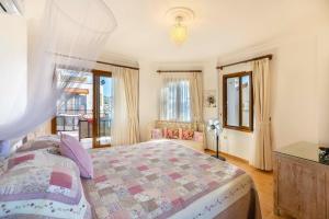 Postel nebo postele na pokoji v ubytování Villa Miramar Kalkan