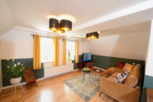 Posezení v ubytování Chalet-Apartmenthaus mit 4 Schlafzimmern!