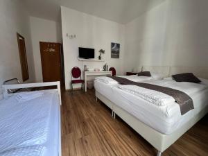 Voodi või voodid majutusasutuse Hotel Croce Federale toas