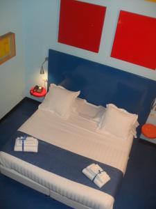 Posteľ alebo postele v izbe v ubytovaní Correra 241 Lifestyle Hotel