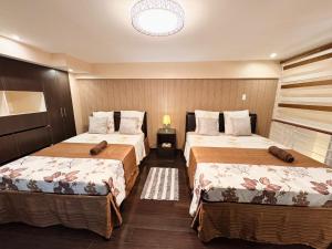 Postel nebo postele na pokoji v ubytování Super Cebu Loft