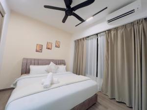 Postel nebo postele na pokoji v ubytování Agile TRX Luxury suite Bukit bintang