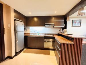 Kuchyň nebo kuchyňský kout v ubytování Super Cebu Loft
