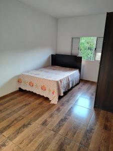 Postel nebo postele na pokoji v ubytování Chácara Esmeralda + 9 fotografií