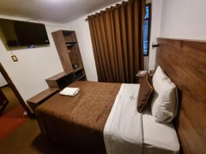 Postel nebo postele na pokoji v ubytování San Francisco Pardo Hotel