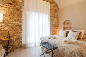 Postel nebo postele na pokoji v ubytování Hotel-Spa Classic Begur