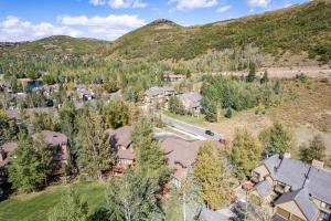 an aerial view of a home with a mountain at Glenfiddich Condo, Deer Valley Resort, Cozy Interiors, Private Patio, Private Hot Tub, Stunning View in Park City