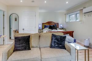 a living room with a couch and a bed at Family-Friendly Newfield Studio 9 Mi to Ithaca! in Newfield