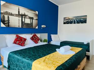 Postel nebo postele na pokoji v ubytování Venice Stay