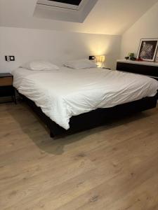 Letto o letti in una camera di B&B Au coin des sources
