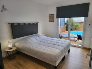 Postel nebo postele na pokoji v ubytování Gîte 2 Newlook
