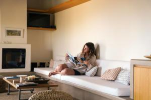 A television and/or entertainment centre at Avdos' olive house - land tales
