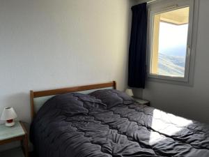 Posteľ alebo postele v izbe v ubytovaní Résidence Balcons Du Soleil 1 - T2/6pers BALCONS DU SOLEIL 51- Peyresourde MAE-9524 + 4 fotografie