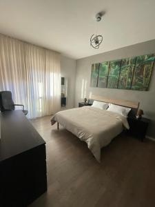Postel nebo postele na pokoji v ubytování CC apartment