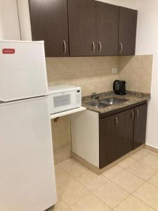 Una cocina o kitchenette en Excelente dpto en Cordoba 3 fotos más