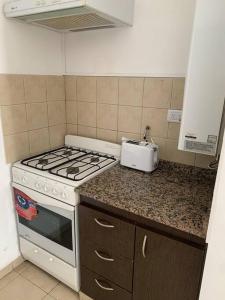 Una cocina o kitchenette en Excelente dpto en Cordoba