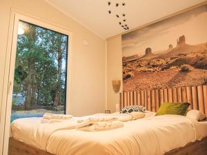 Postel nebo postele na pokoji v ubytování Modern holiday home with terrace