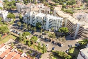 an overhead view of a city with tall buildings at Modern apartment in Vilamoura with shared pool in Vilamoura