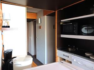 Nhà bếp/bếp nhỏ tại Résidence Rouelles - Appartement 2 pièces 6 personnes à Arc 1600 en centre station et proche des pistes MAE-9221 +7 ảnh