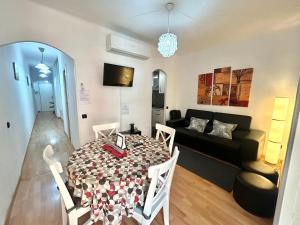 Televízia a/alebo spoločenská miestnosť v ubytovaní Apartment carrer d'Olesa