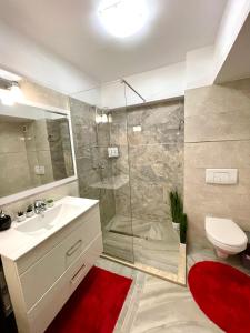 Et badeværelse på Ema Luxury Apartment Ultracentral + 39 billeder