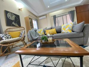 Khu vực ghế ngồi tại Appart Neuf et Lumineux à 2 Pas d'Angre Chu