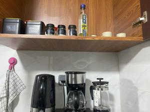 Tiện nghi pha trà/cà phê tại Appart Neuf et Lumineux à 2 Pas d'Angre Chu