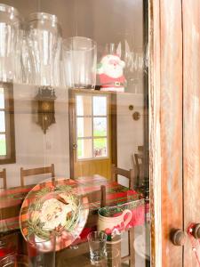 a dining room table with a plate of food on it at Casarão Solar dos Almeida in Diamantina +26 photos