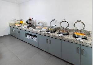 Kuchyň nebo kuchyňský kout v ubytování Hotel México Plaza Irapuato