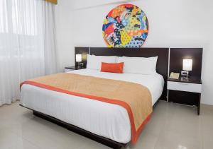Postel nebo postele na pokoji v ubytování Hotel México Plaza Irapuato