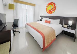 Postel nebo postele na pokoji v ubytování Hotel México Plaza Irapuato