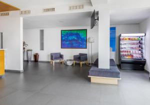 TV a/nebo společenská místnost v ubytování Hotel México Plaza Irapuato