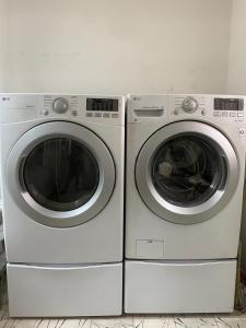 two washing machines are sitting next to each other at Luna Menguante in Monterrey