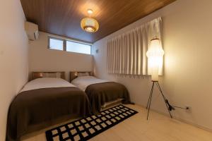Postel nebo postele na pokoji v ubytování Hotel Beswe