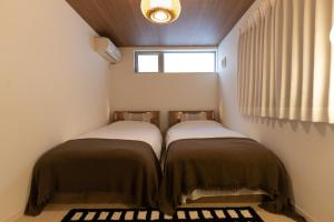Postel nebo postele na pokoji v ubytování Hotel Beswe