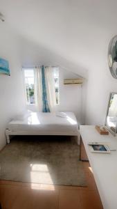 Letto o letti in una camera di Cocoon Paradise